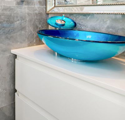 Bathroom with a Round Washbasin, Ceramic Countertop and Cabinet with Drawers